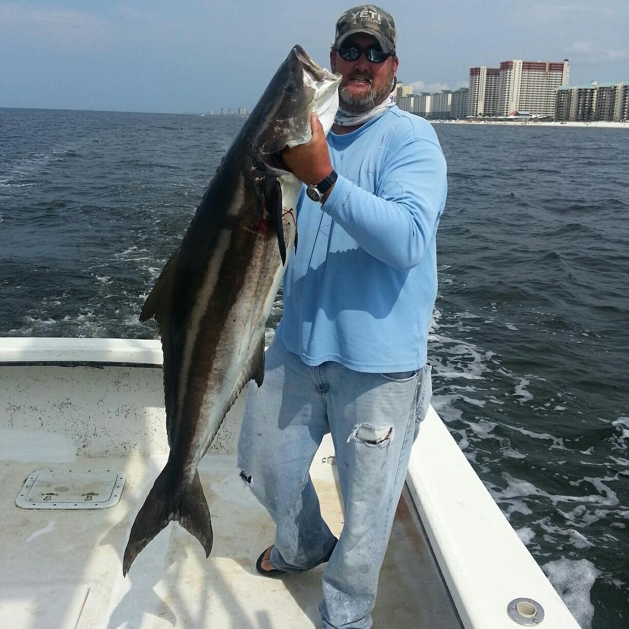 Captain Larry showing off a Cobia